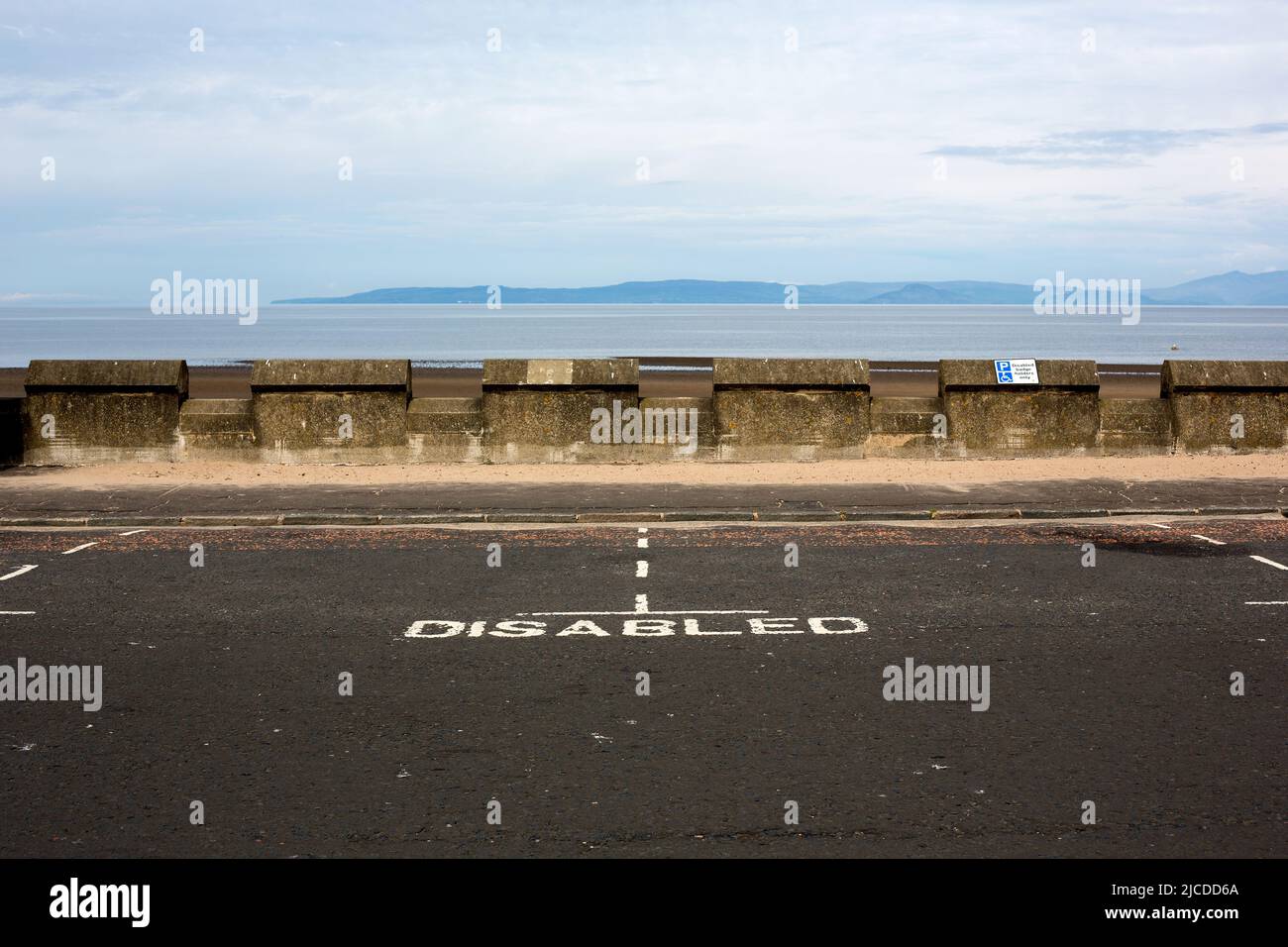 Disabled parking spaces at a coastal location Stock Photo