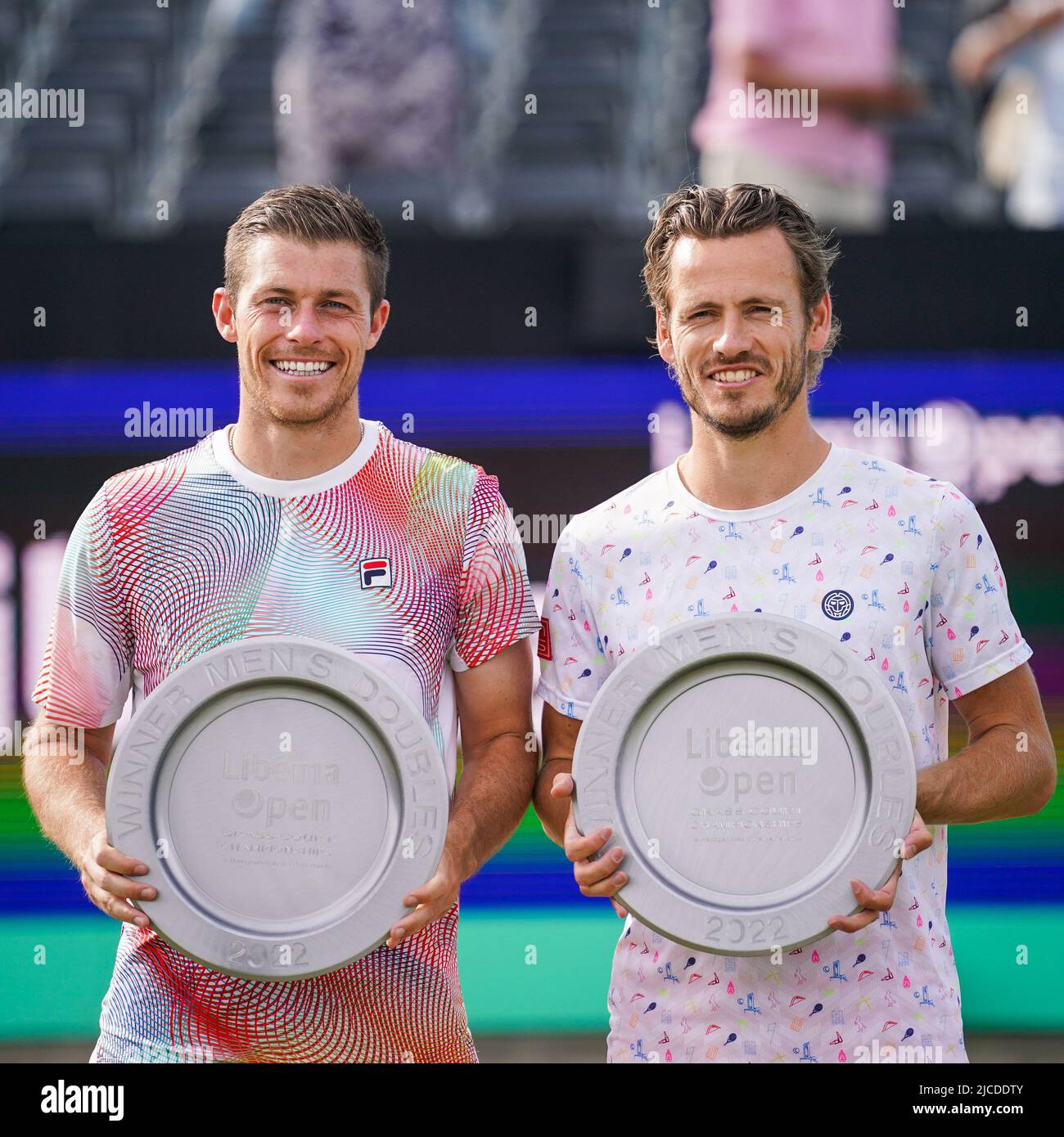 'S-HERTOGENBOSCH, NETHERLANDS - JUNE 12: Neal Skupski of Great-Britain and Wesley Koolhof of the Netherlands poses with their trophies after the Mens Doubles Final match between Matthew Ebden of Australia and Max Purcell of Australia and Wesley Koolhof of the Netherlands and Neal Skupski of Great-Britain at the Autotron on June 12, 2022 in 's-Hertogenbosch, Netherlands (Photo by Joris Verwijst/BSR Agency) Stock Photo