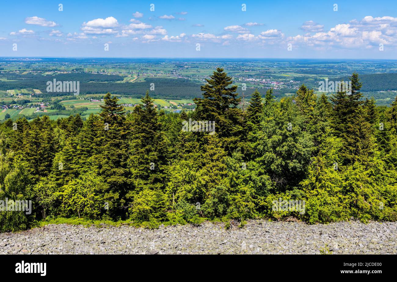 Panorama of Gory Swietokrzyskie Mountains and valleys with Goloborze Lysa Gora stone run slopes on Swiety Krzyz mount hilltop near Nowa Slupia village Stock Photo