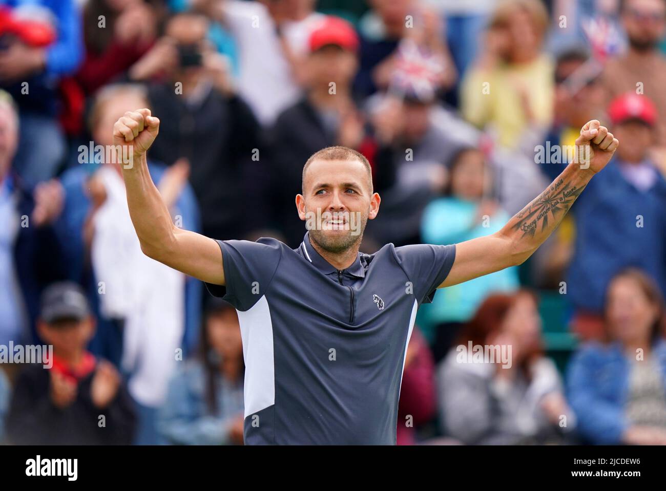 Great Britain's Dan Evans celebrates after winning his men's singles