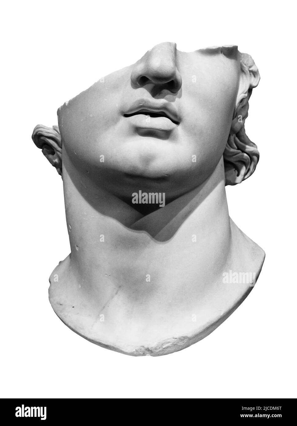 Antique broken marble head of a Greek youth from Hellenistic period, 2nd century B.C. Close up isolated stone object Stock Photo