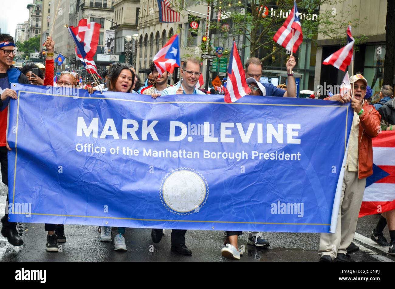 Manhattan Borough President Mark Levine marches up Fifth Avenue in New