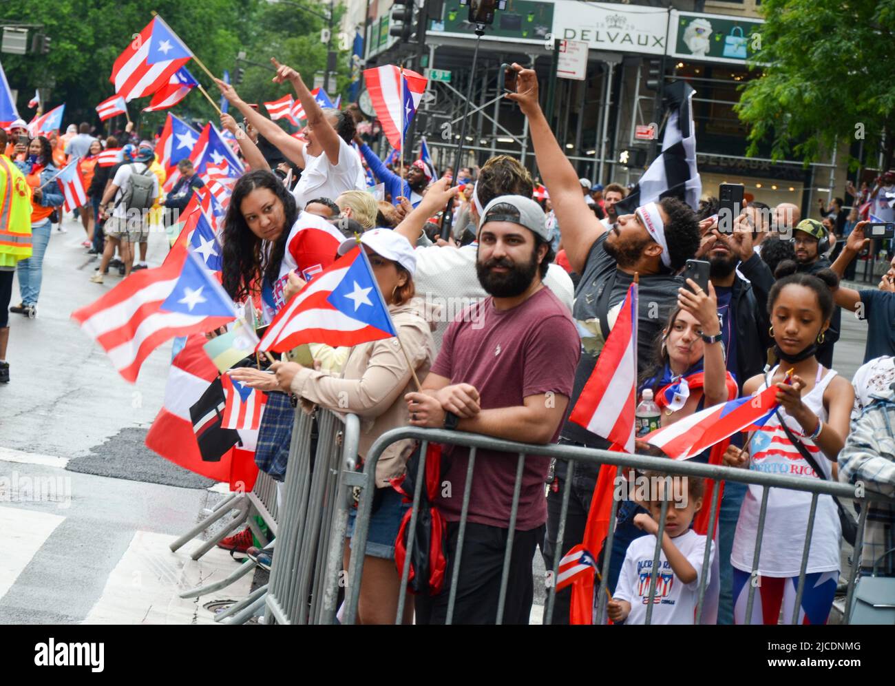 Puerto Rican New Yorkers are seen enjoying the 65th annual Puerto Rican Day Parade on June 12, 2022 in New York City. Stock Photo