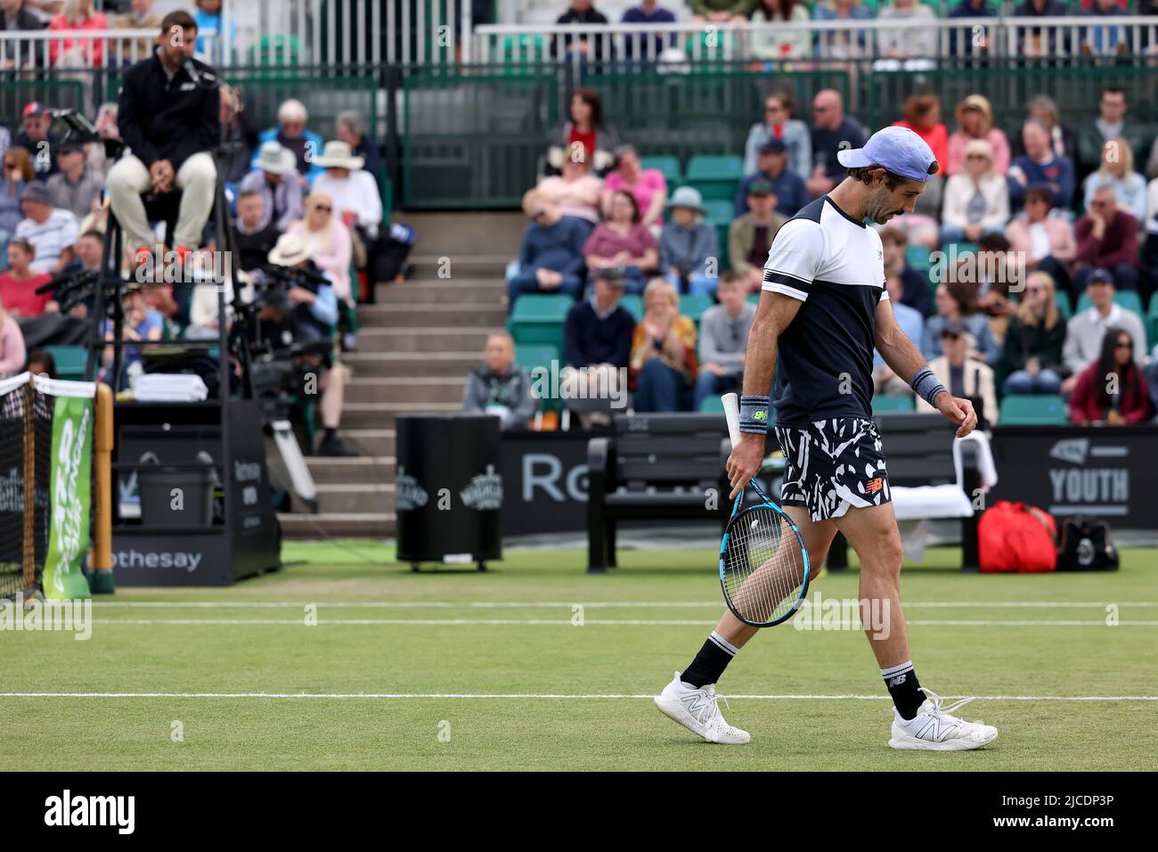 12th June 2022; Nottingham Tennis Centre, Nottingham, England: Rothesay Open  Nottingham Lawn Tennis tournament; Jordan Thompson (usa) walks away from  the umpire after complaining about decisions during the mens singles final  with