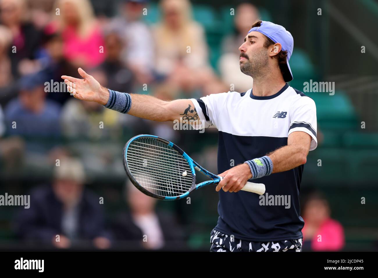 Nottingham Tennis Centre, Nottingham, England: 12th June 2022;  Rothesay Open Nottingham Lawn Tennis tournament; Jordan Thompson (usa) complains about a out call during the mens singles final with Daniel Evans (gbr) Stock Photo