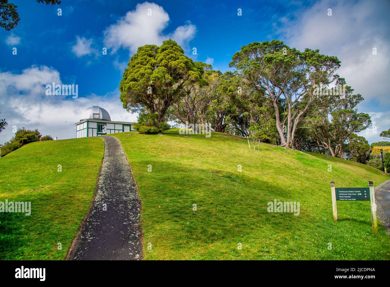 Top of a hill with cty view, road to observatory. Stock Photo