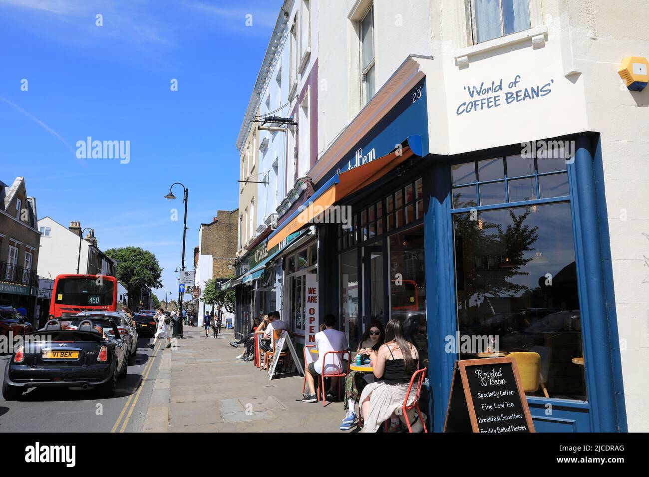 Trendy Roasted Bean coffee shop and cafe on Westow Street in Crystal Palace,  south London, UK Stock Photo - Alamy