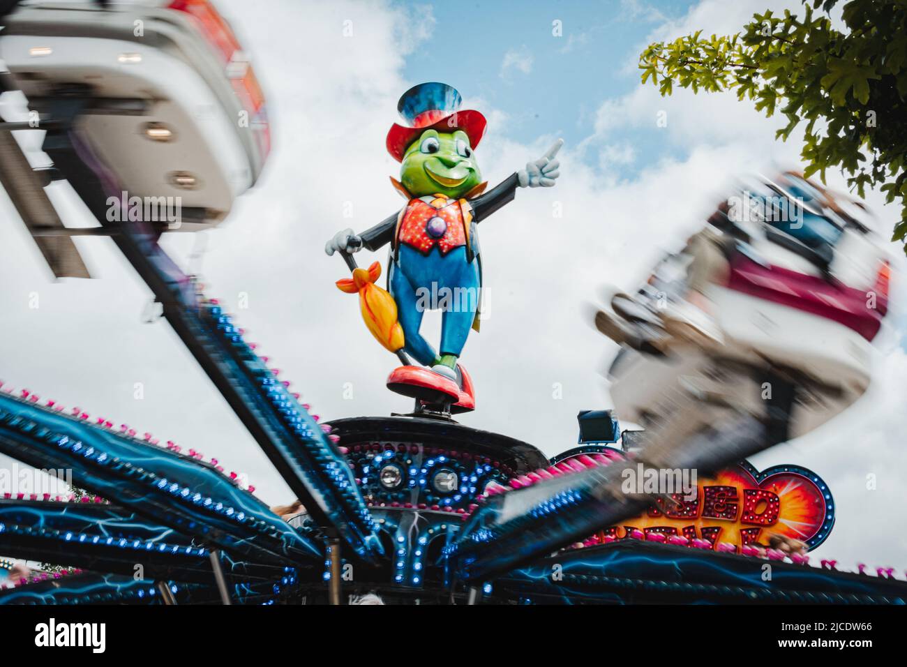 Jiminy Cricket fair ride at Morpeth Fair Day June 2022, Northumberland Stock Photo