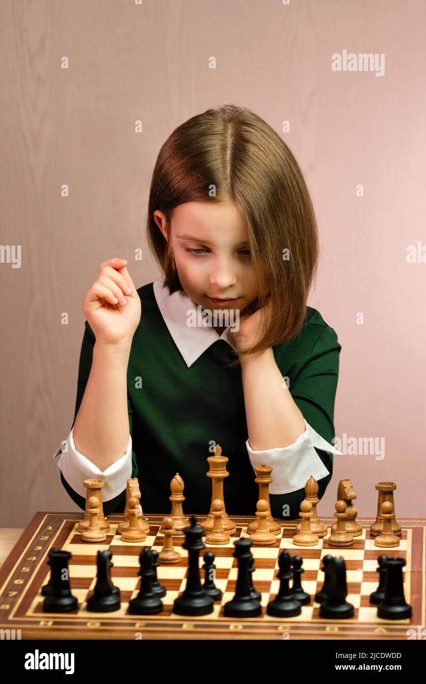 Thoughtful Young Chess Player Before Start Chess Game. School Girl
