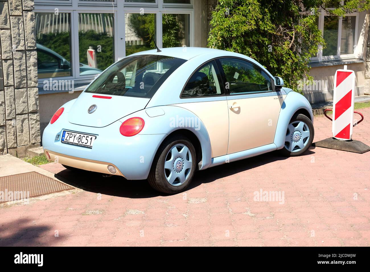 Lublin, Poland, 12 July 2022 baby blue and cream new volkswagen beetle Stock Photo
