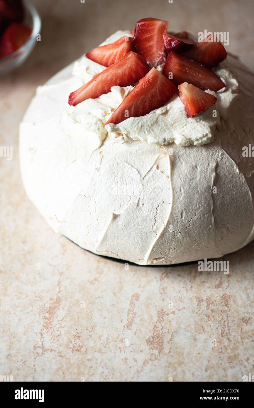 Summer fruit pavlova famous Australian dessert from baked whipped egg