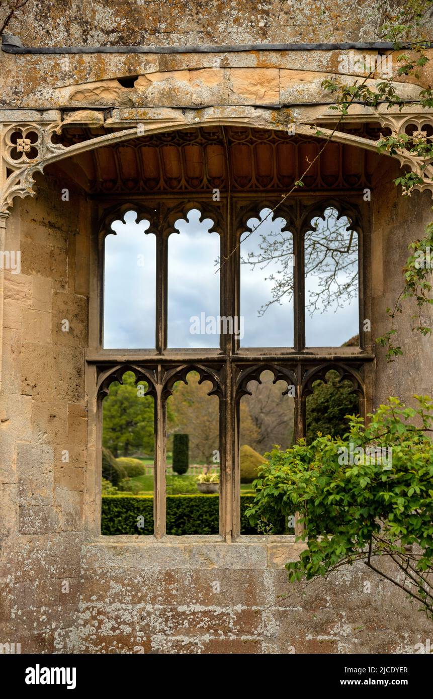 Richard III Banqueting Hall, a 15th century ruin with view of the Sudeley Castle Garden through the lancet windows, Gloucestershire, England, UK. Stock Photo
