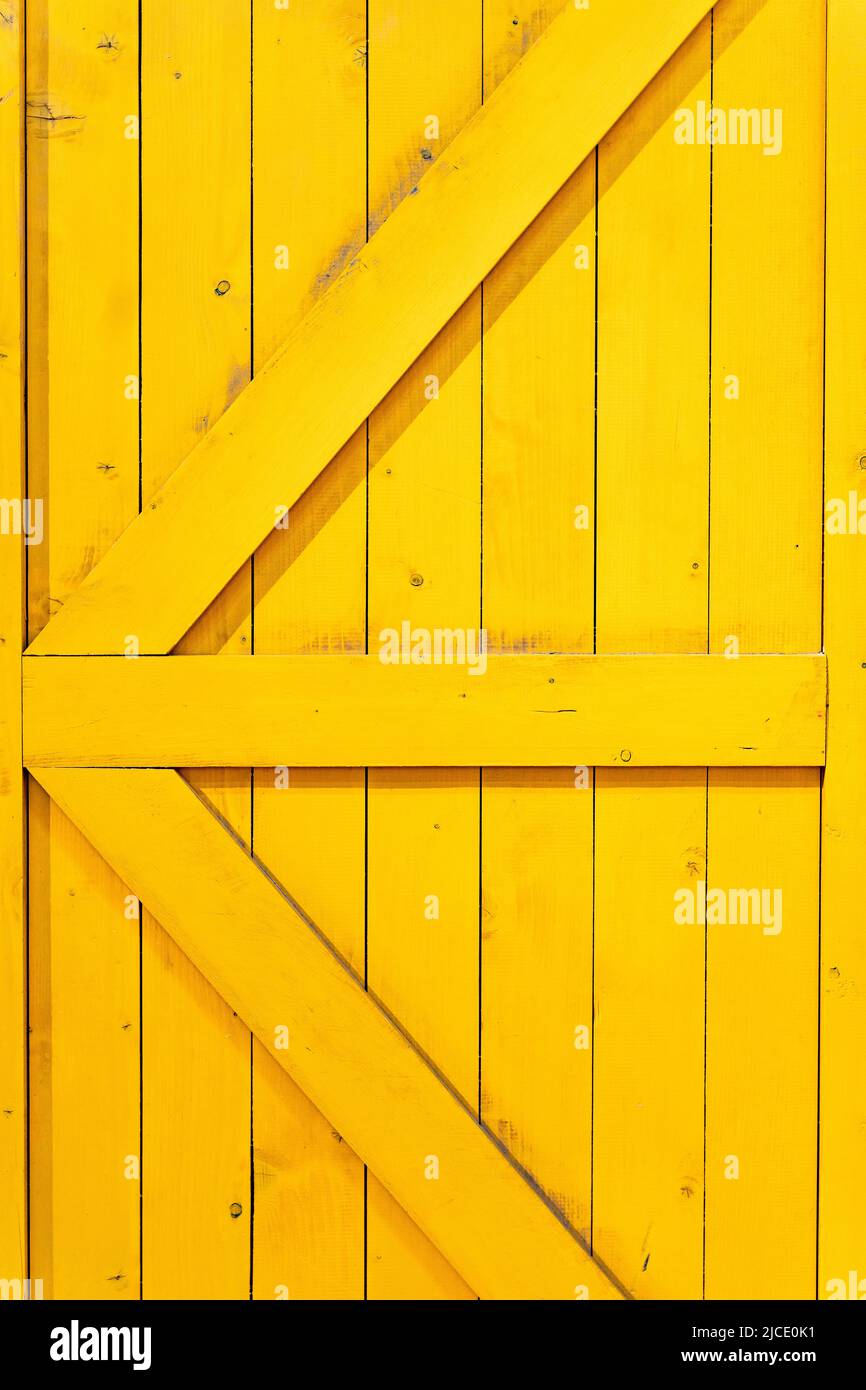 Sunny yellow rustic e wooden texture, wood background banner. cheerful