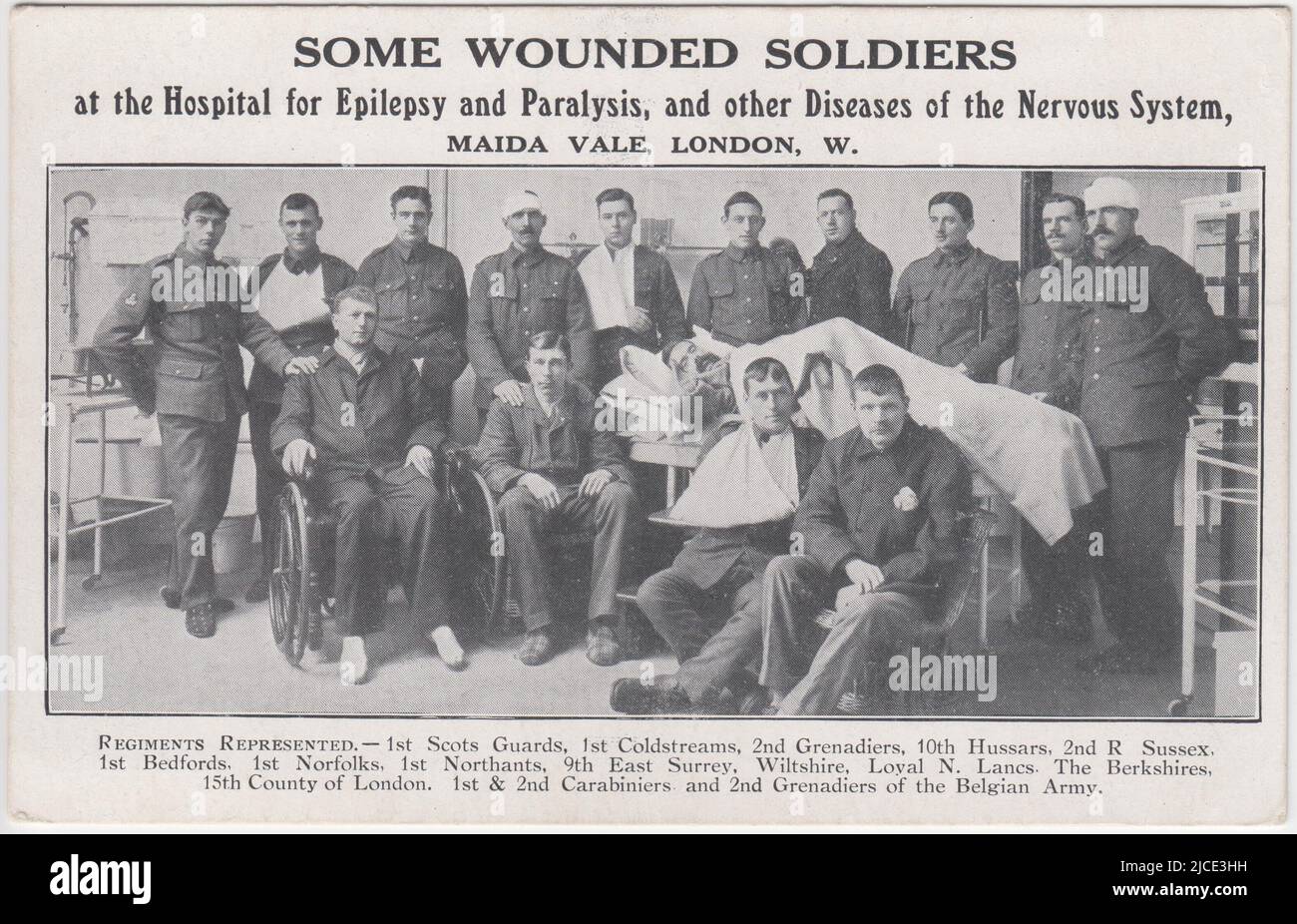 'Some Wounded Soldiers at the Hospital for Epilepsy and Paralysis, and other Diseases of the Nervous System, Maida Vale, London': group of First World War soldiers in uniform, including one man in a wheelchair, one lying in a hospital bed, and others with bandages around their arms and heads. Regiments represented include Scots Guards, Coldstream Guards, Grenadiers, 10th Hussars, Sussex, Bedfordshire, Norfolk, Northamptonshire, East Surrey, Wiltshire, Loyal North Lancashire, Berkshire & 15th County of London Regiment, Carabiniers & the Belgian army Stock Photo