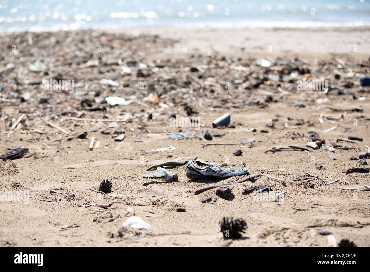 Environmental pollution, beached garbage and old shoes Stock Photo Alamy