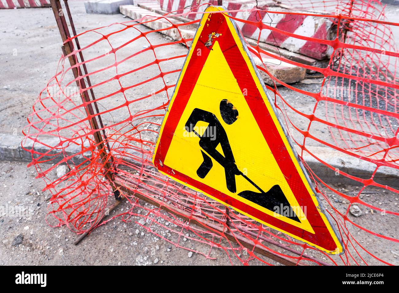 Road works sign at the city street. Under construction road Stock Photo ...