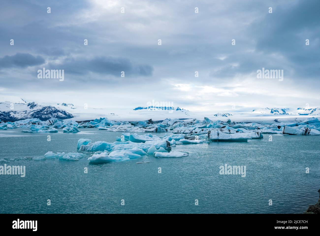 Beautiful icebergs floating in Jokulsarlon glacier lagoon in polar climate Stock Photo