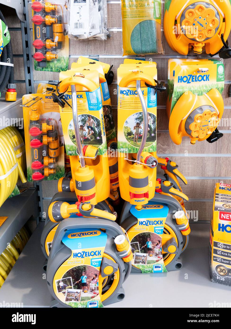 Display of Hozelok proprietary hose fittings on display in a garden centre Stock Photo