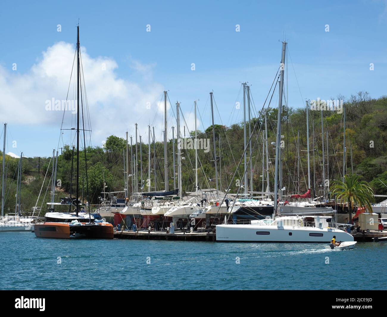 View of the boatyard in English Harbour in Antigua with yachts and other boats docked for maintenance Stock Photo