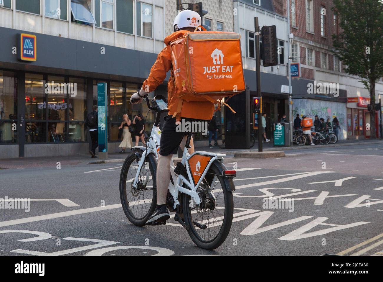 Just Eat bicycle courier in Brighton, East Sussex Stock Photo