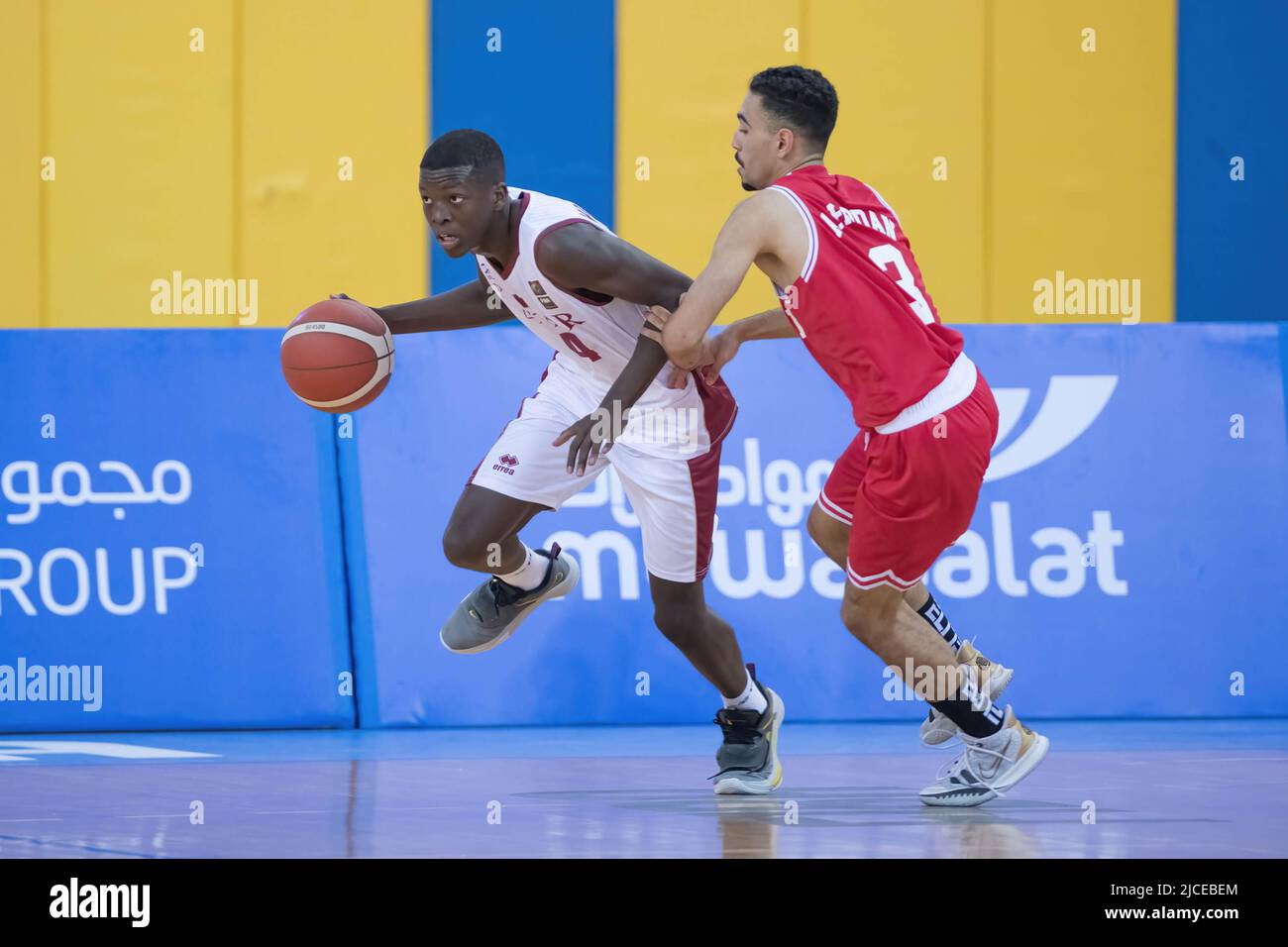 Doha, Qatar. 12th June, 2022. Mohamed Massamba Ndao (L) of Qatar