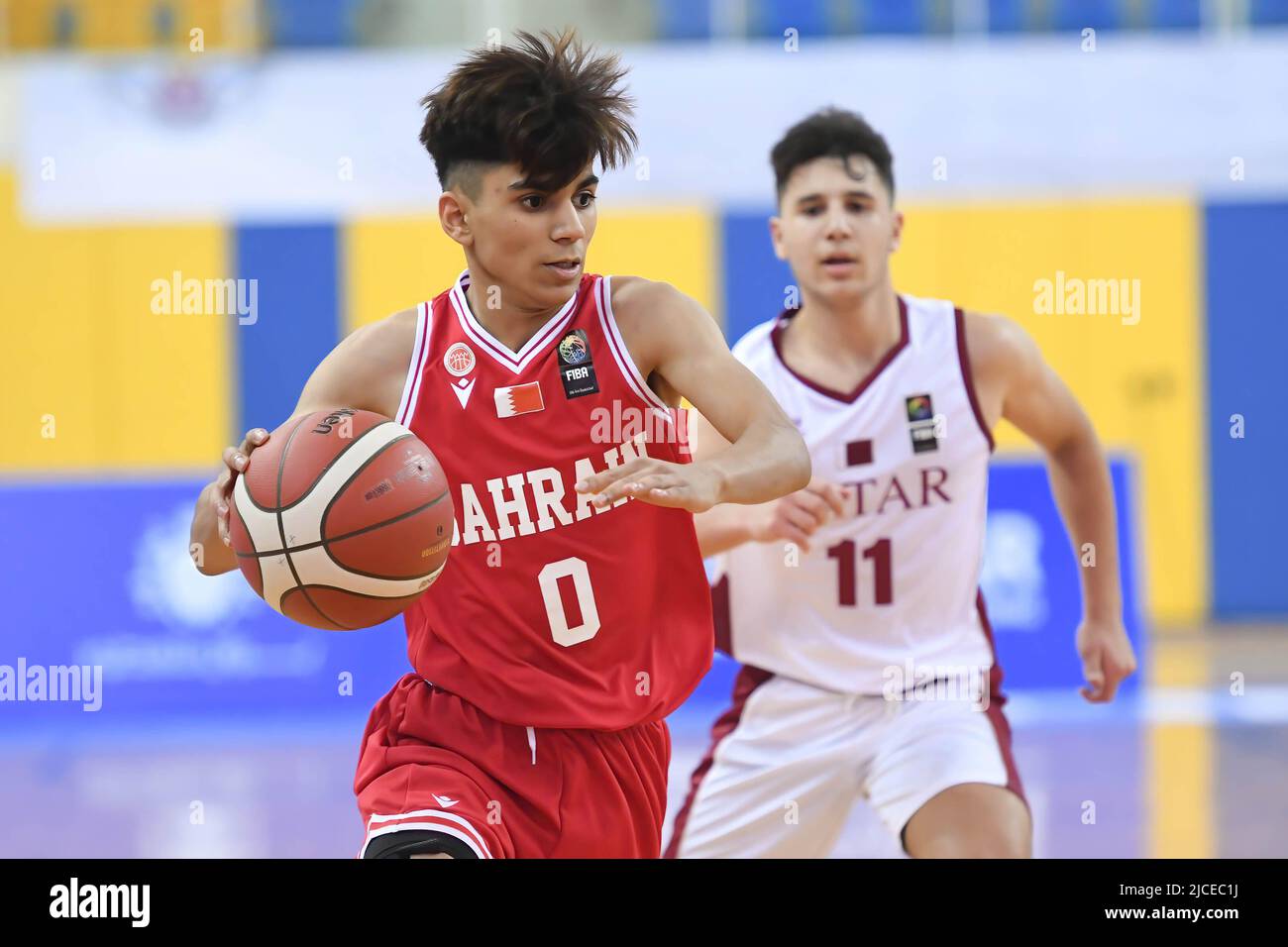 Doha, Qatar. 12th June, 2022. Abdulla Ahmed (L) of Brunei Basketball