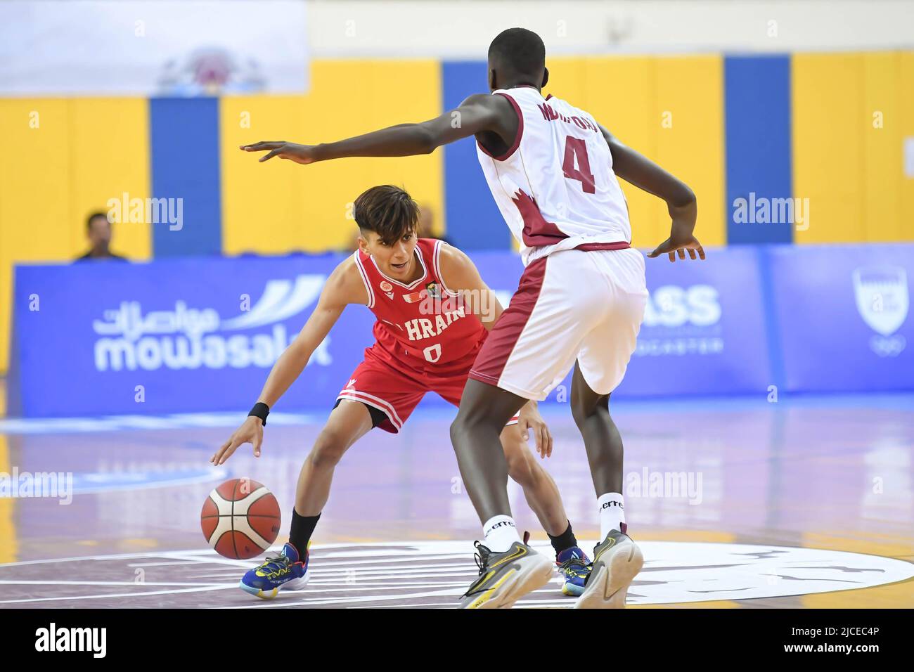 Doha, Qatar. 12th June, 2022. Abdulla Ahmed (L) of Brunei Basketball