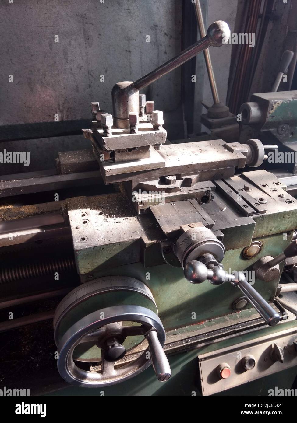 Part of lathe in old plant. Old vintage turning lathe for metal processing Stock Photo Alamy