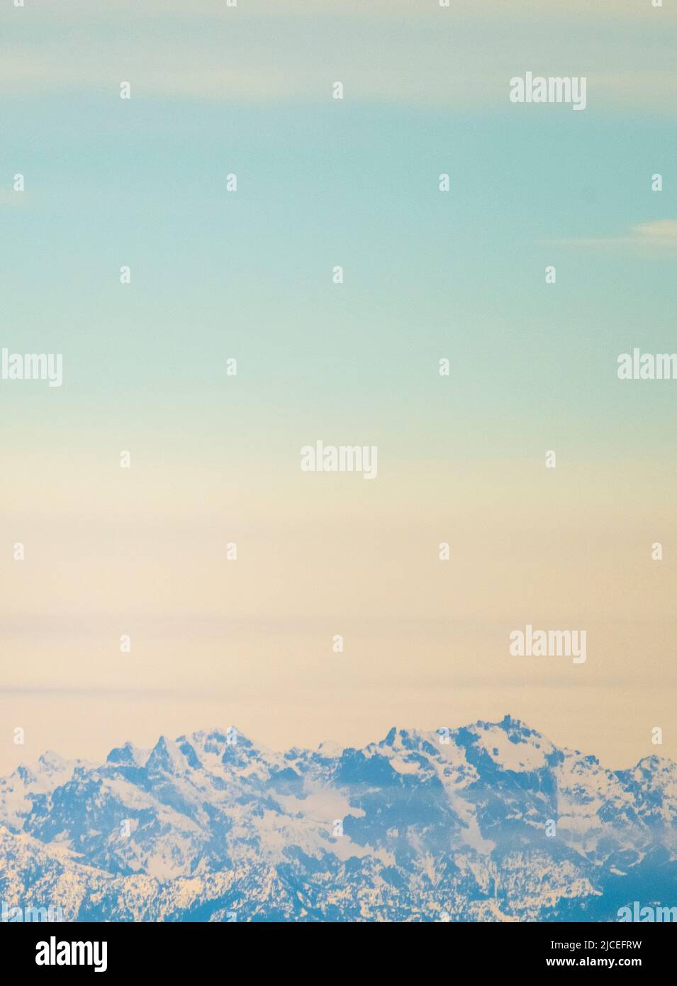 snow covered Olympic mountain range in the Washington state on a winter day Stock Photo