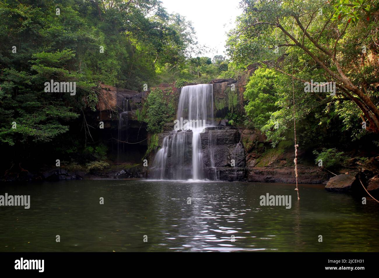 landscape photo, amazing waterfall in green forest Stock Photo
