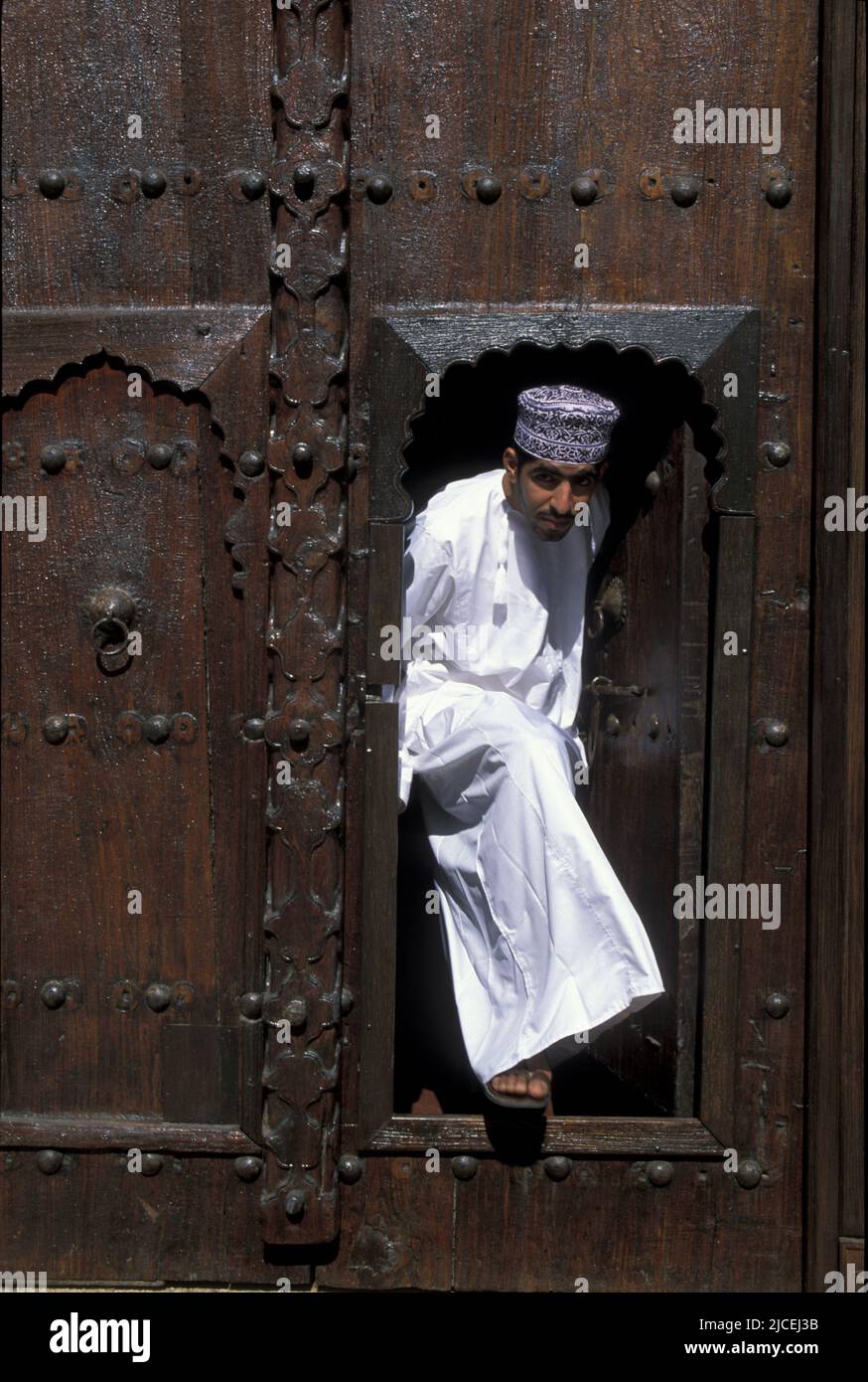 Traditional door within a large door, Muscat, Oman 1980s Stock Photo