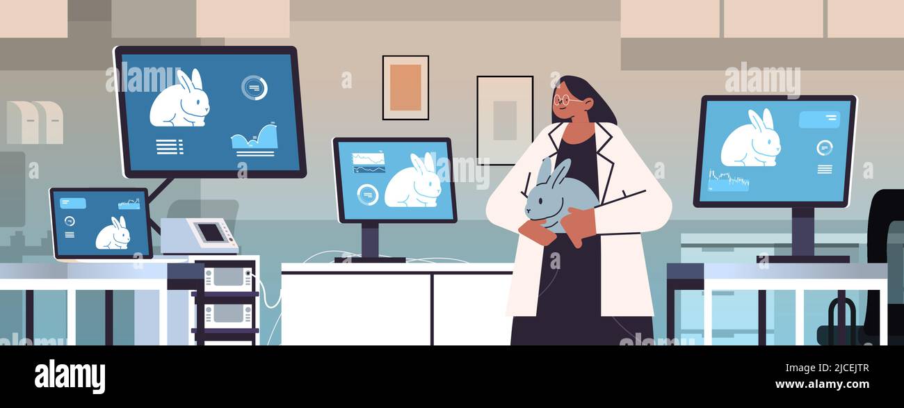 scientist work on desktop with rabbits on screens veterinary worker ...