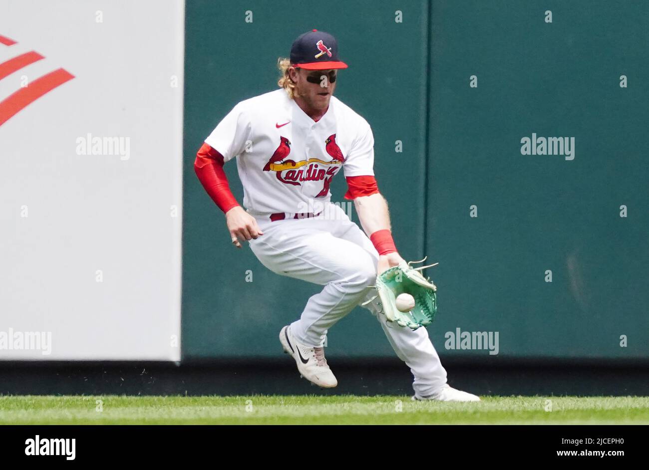 St. Louis, United States. 12th June, 2022. St. Louis Cardinals Harrison Bader fields a ball in center field off the bat of Cincinnati Reds Brandon Drury in the fourth inning at Busch Stadium in St. Louis on Sunday, June 12, 2022. Photo by Bill Greenblatt/UPI Credit: UPI/Alamy Live News Stock Photo
