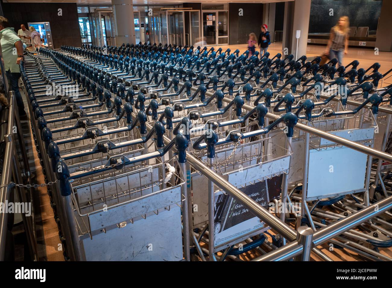 there are many baggage carts at the airport Stock Photo Alamy