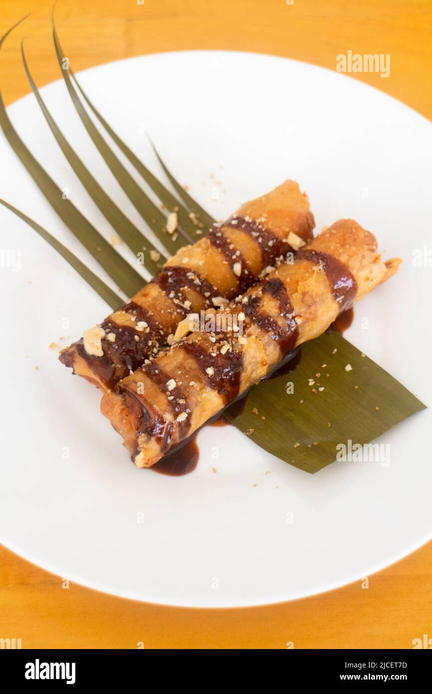 Banana fritter dessert locally called turon in Mactan Island, Cebu, Philippines Stock Photo