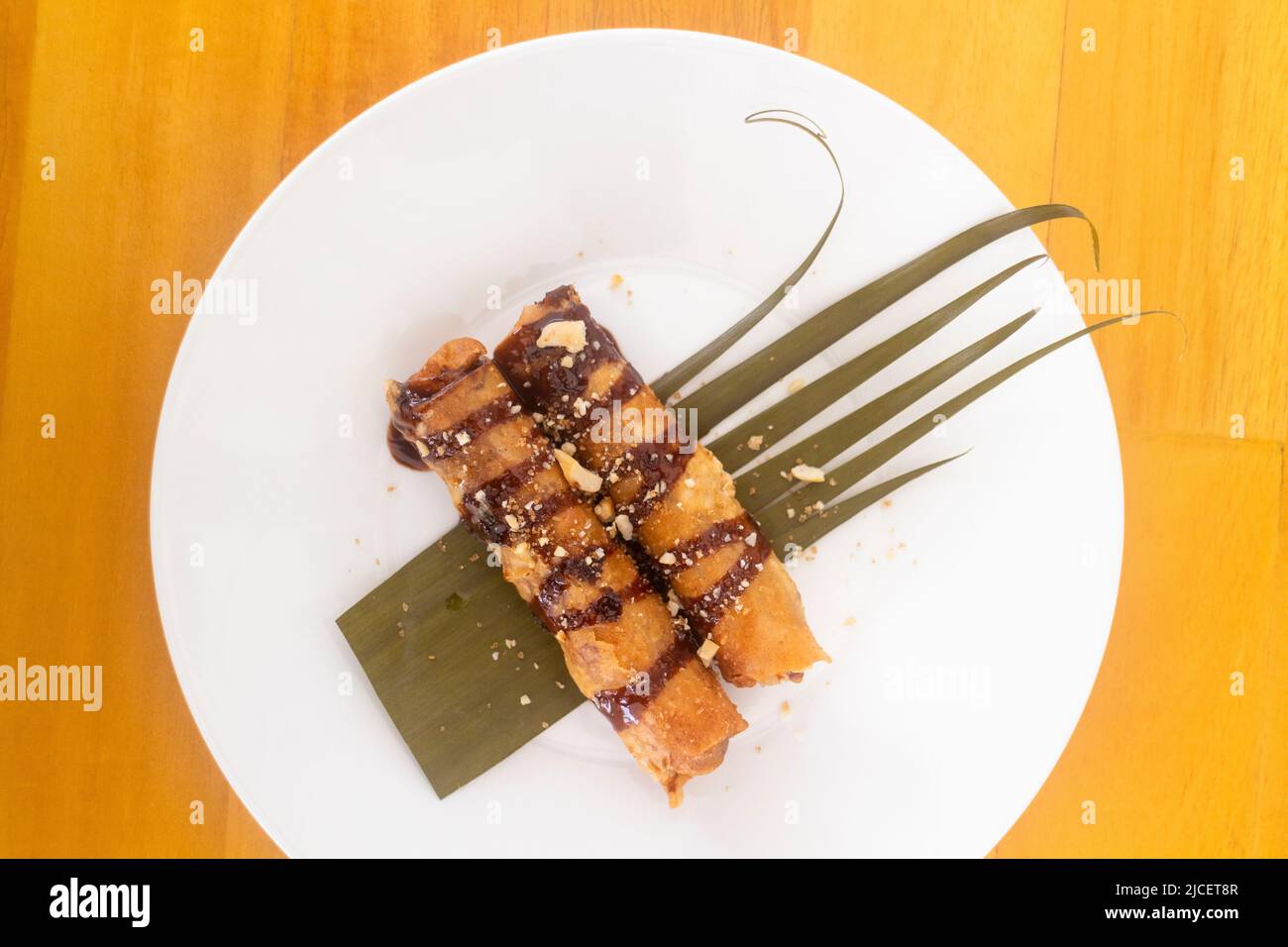 Banana fritter dessert locally called turon in Mactan Island, Cebu, Philippines Stock Photo Alamy