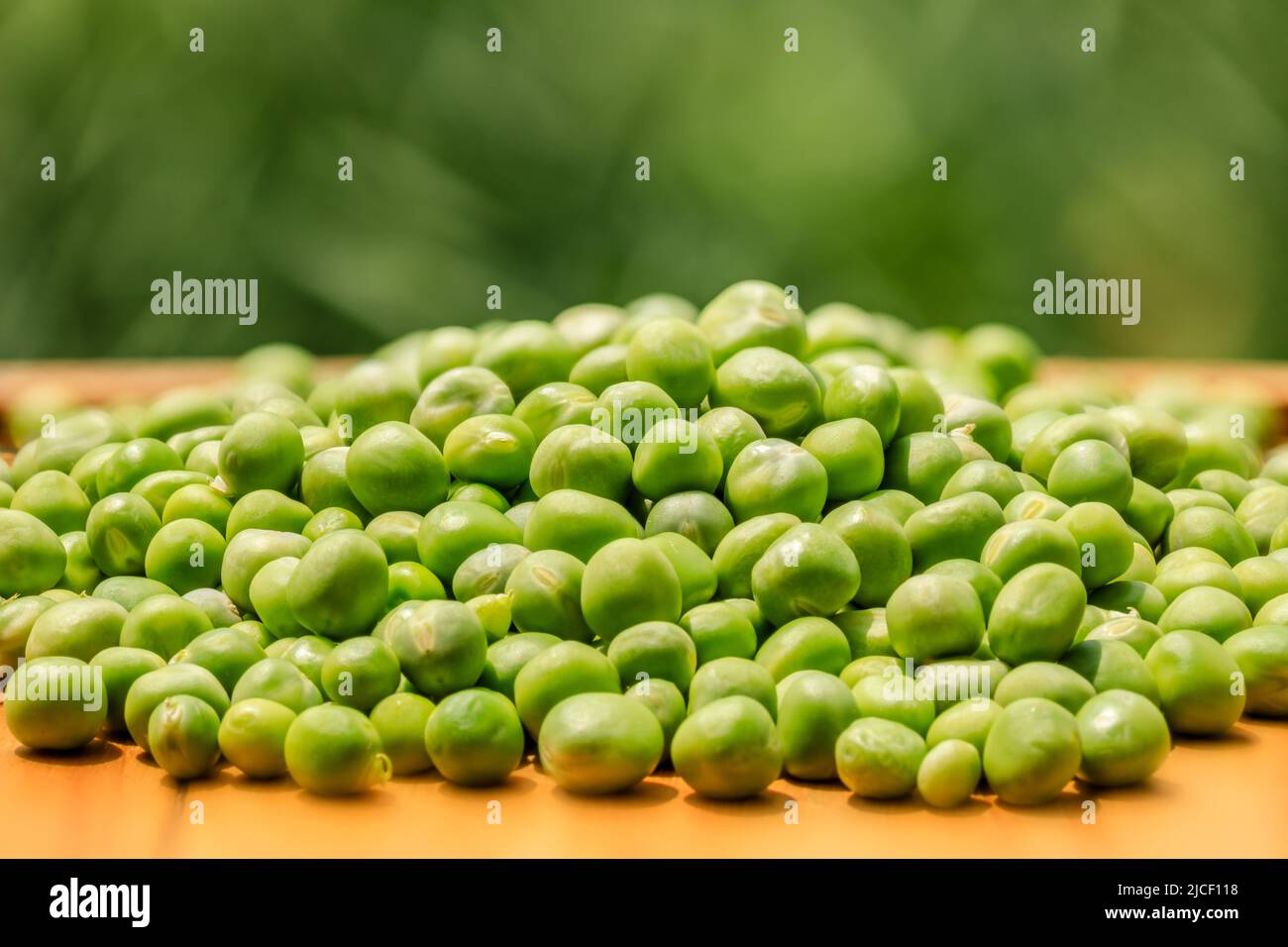 Close up view of fresh raw peas. Healthy organic green raw peas Stock