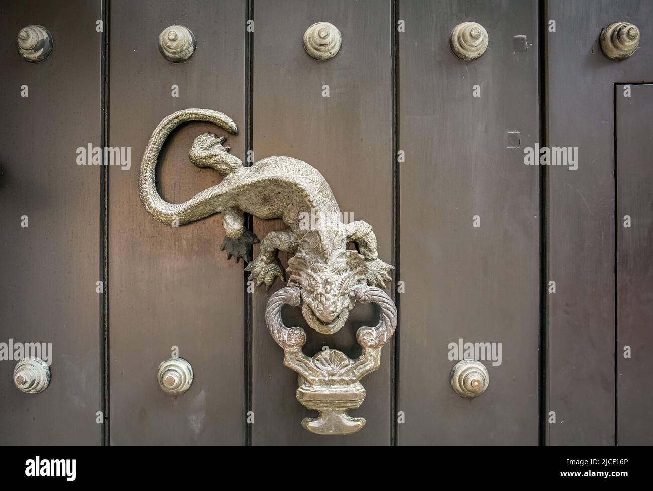 Close-up of traditional door knocker on wooden door in Cartagena, Colombia Stock Photo