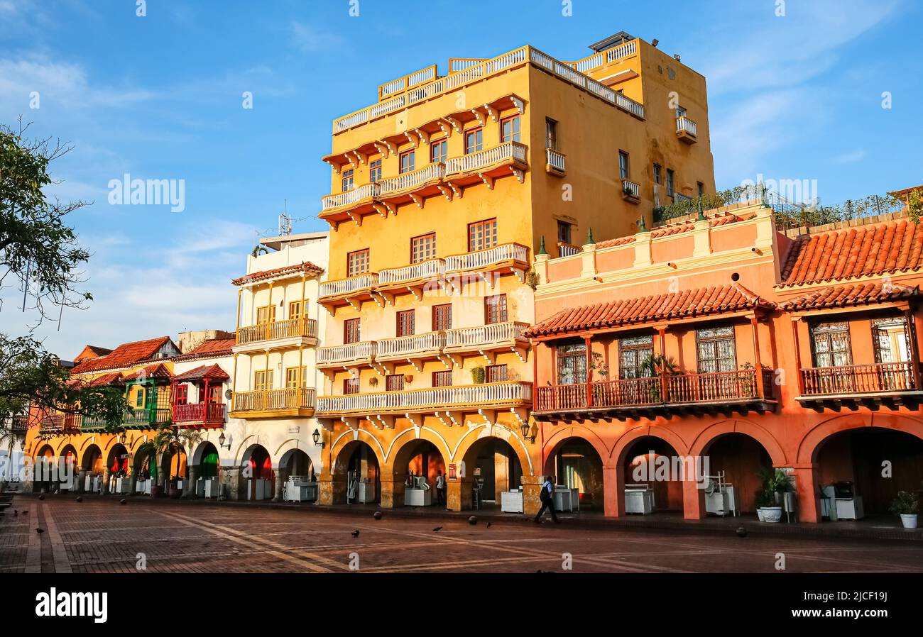View to an ensemble of colorful historic buildings on a sunny day in Cartagena Stock Photo