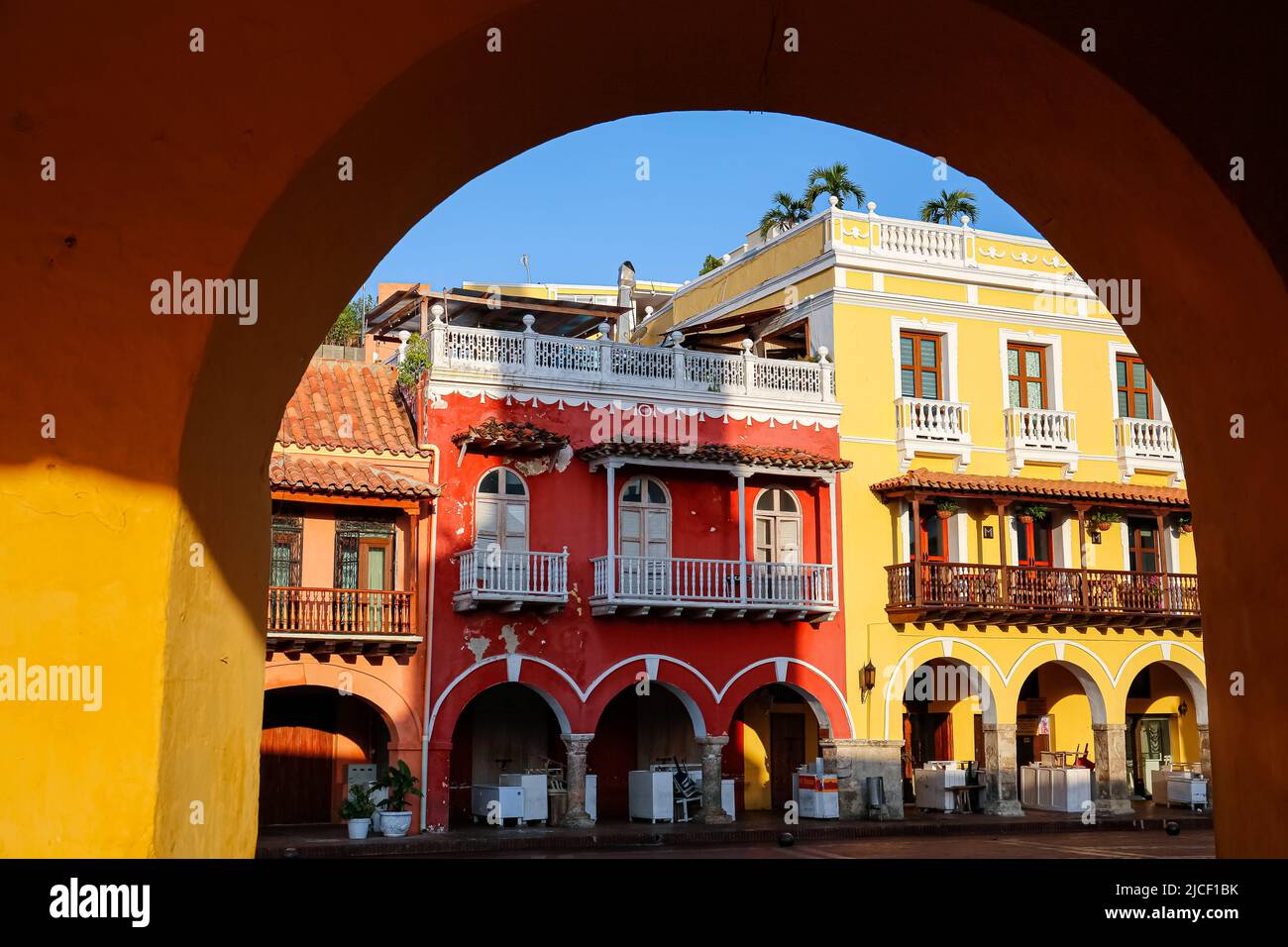 View through an arch to colorful colonial houses in Cartagena, Colombia, Unesco World Heritage Stock Photo