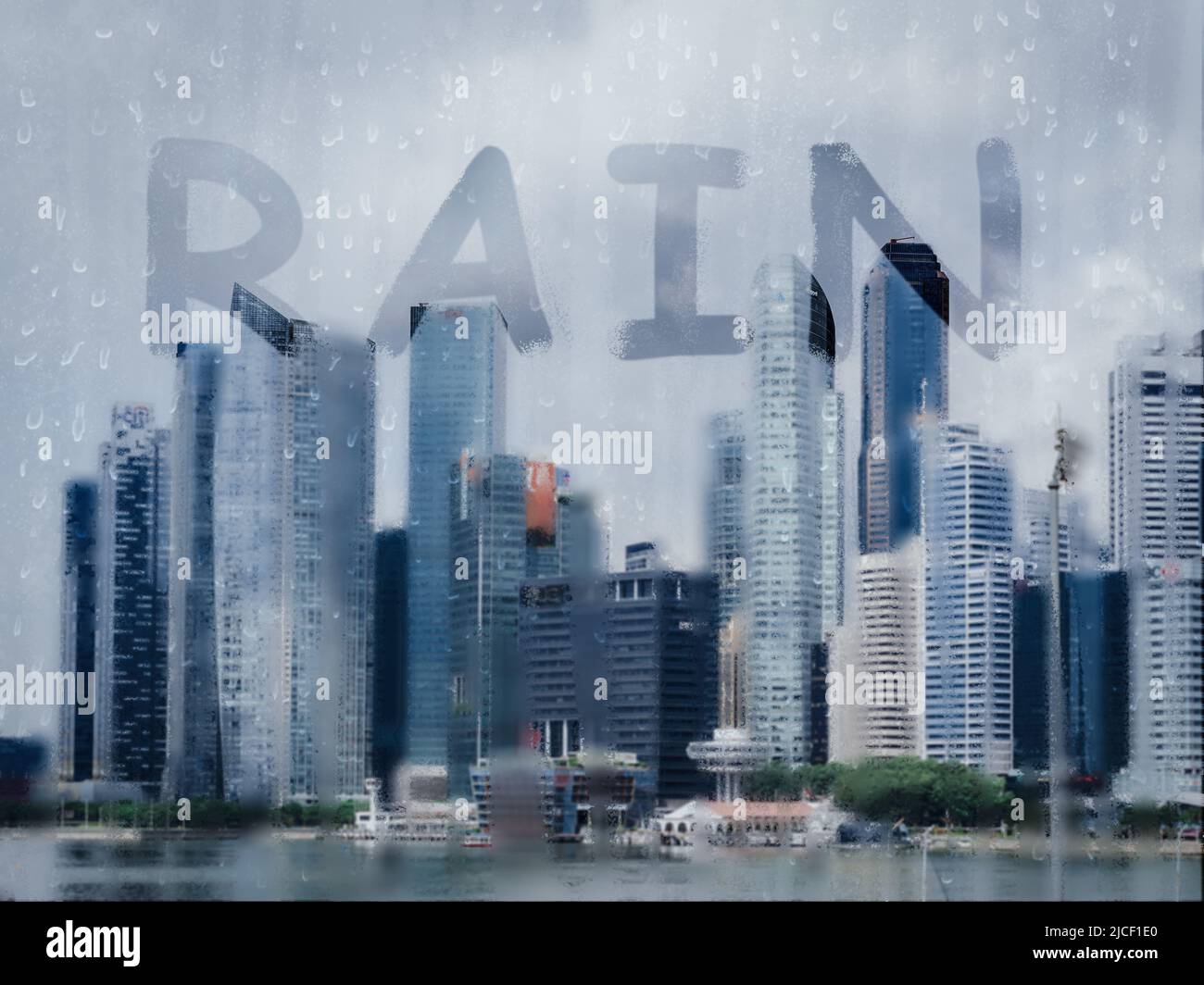 Rain drops on glass with city background. Window view with raining ...