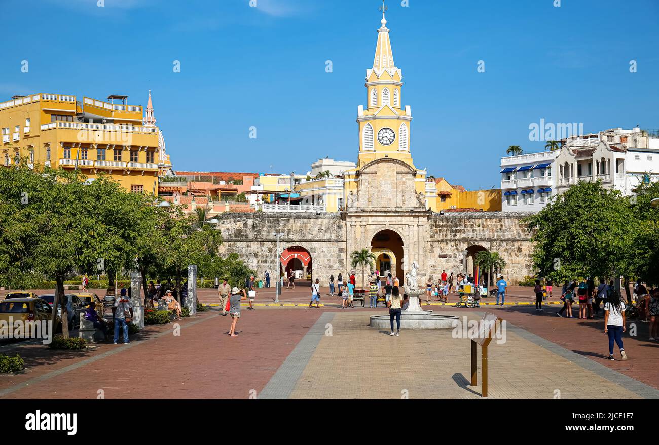 View to Torre de Reloj (Clock Tower) with blue sky and warm light, Cartagena, Colombia, Unesco World Heritage Stock Photo