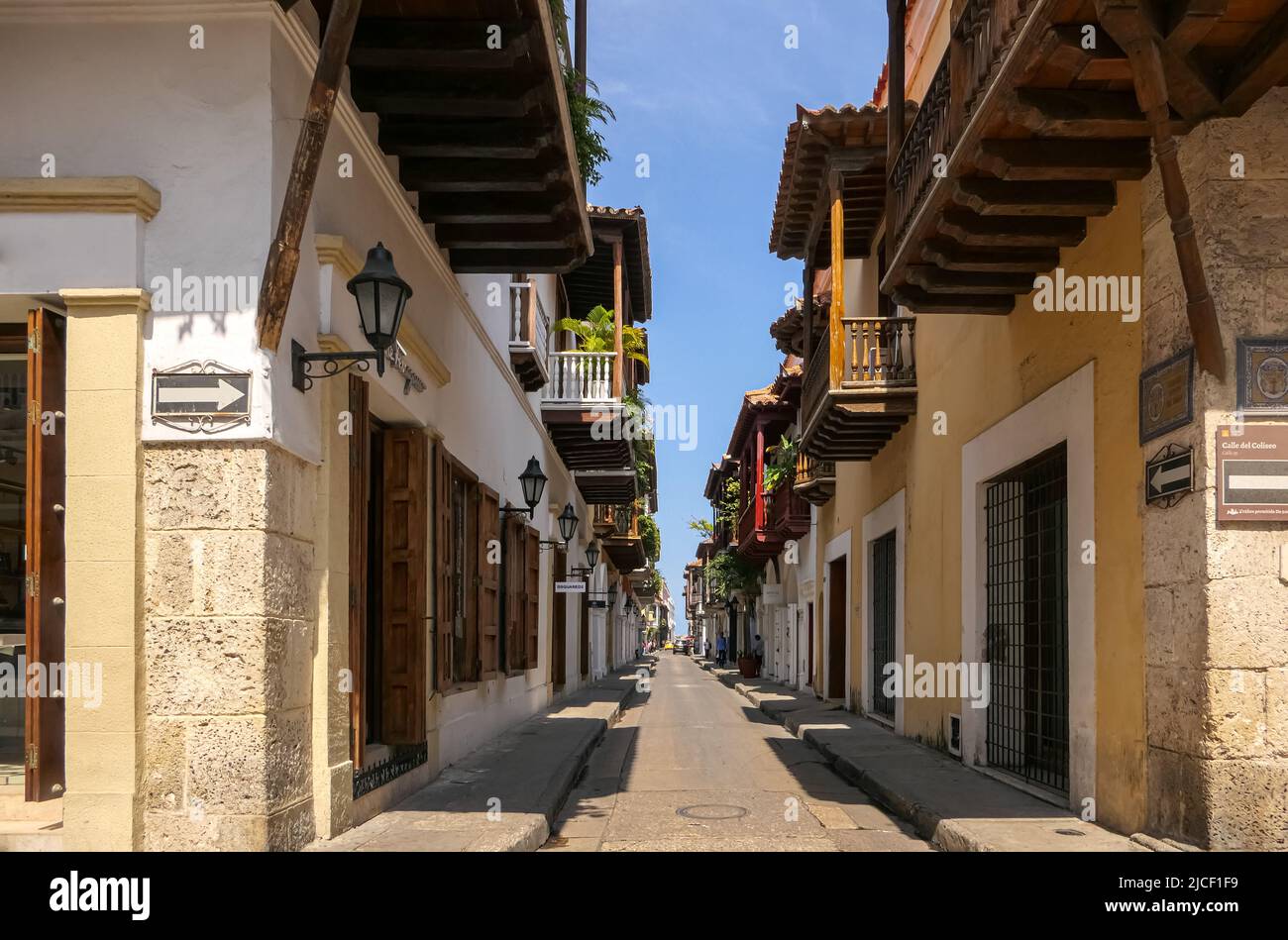 Typical colonial street with blue sky in Cartagena, Colombia Stock Photo