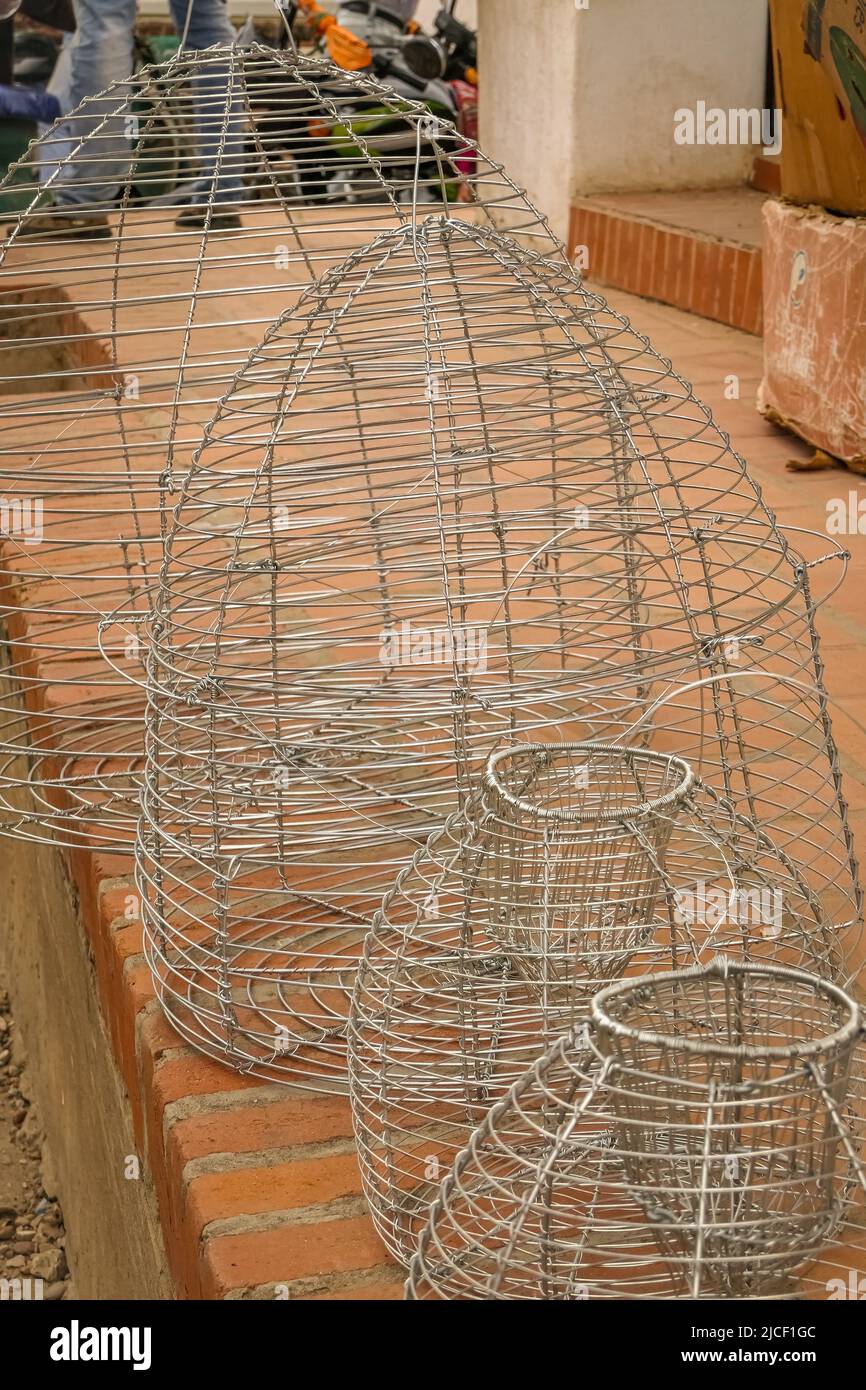 Close up of fish traps in different sizes for sale Stock Photo - Alamy