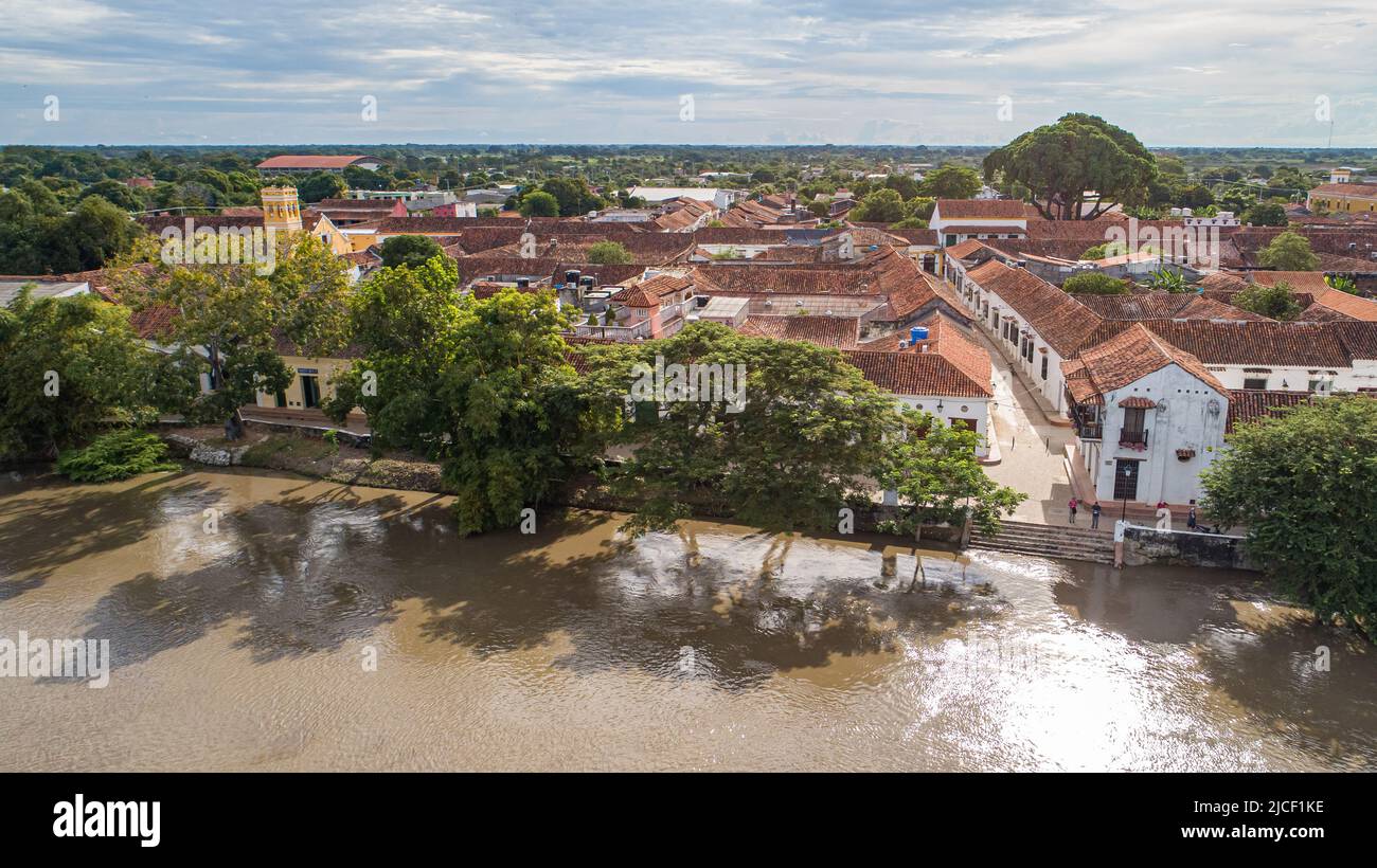Close-up aerial view of the historic town Santa Cruz de Mompox and river in sunlight Stock Photo