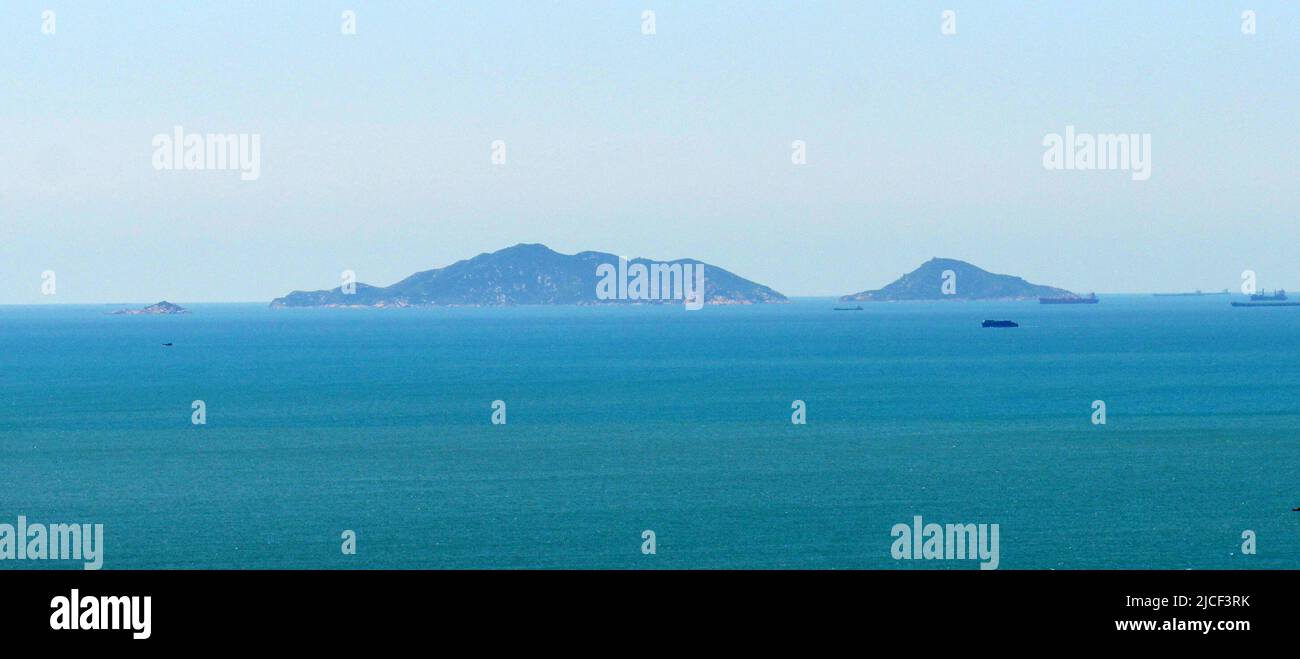 Coastal landscapes of Lantau island seen from the section 11 of the Lantau trail. Hong Kong. Stock Photo