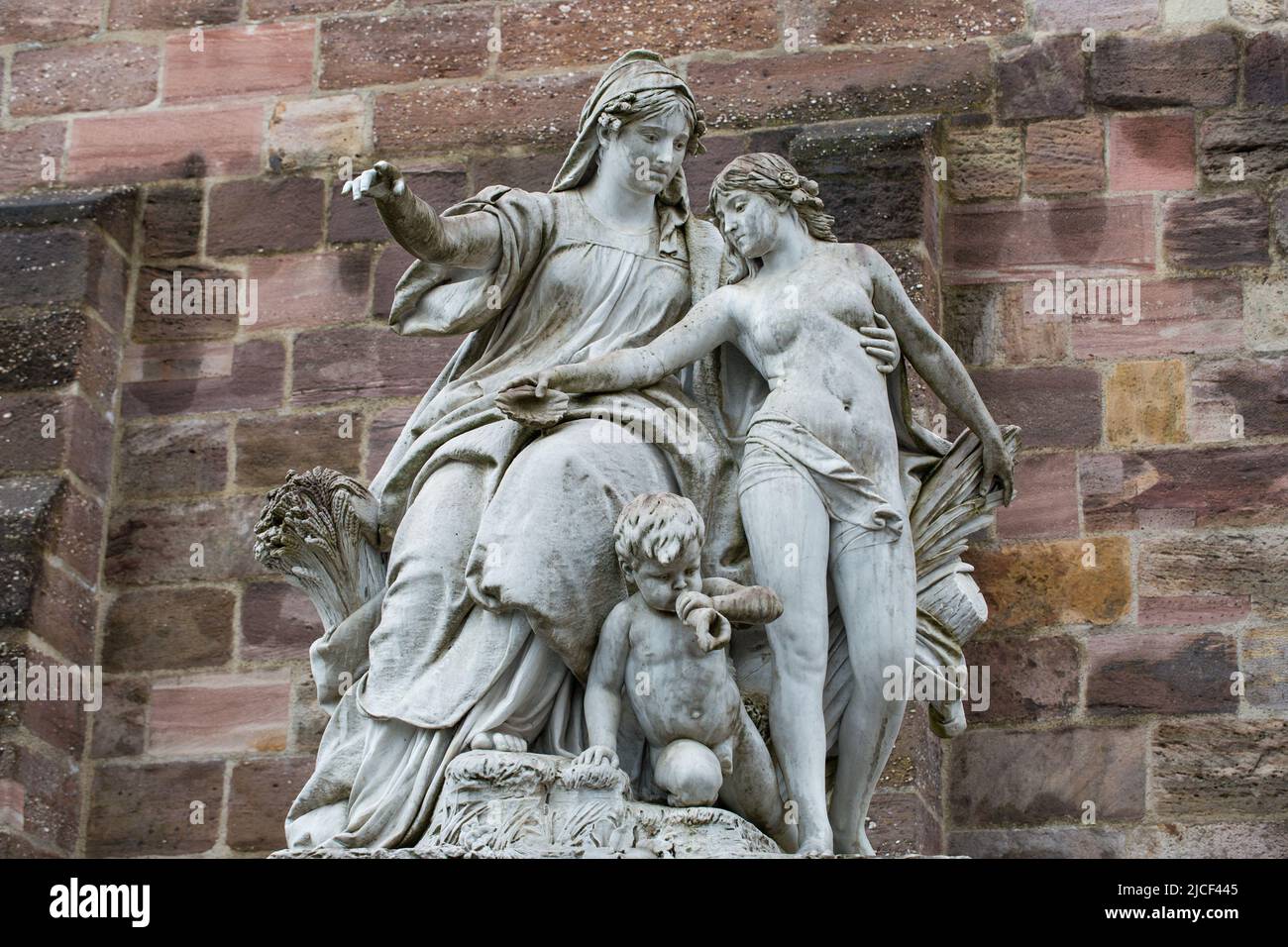 Donaueschingen, Germany - Nov 22, 2021: Sculpture at the spring of river Danube: Mother Baar shows her daughter Danube the way. Stock Photo