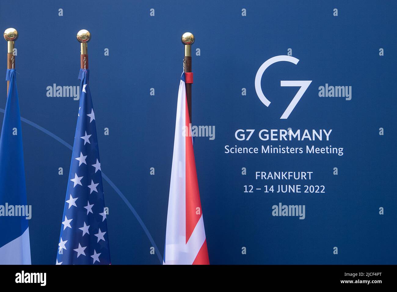 13 June 2022, Hessen, Frankfurt/Main: The flags of France (l-r), the USA and Great Britain stand next to the lettering 'G7 Germany Science Ministers Meeting' before the meeting of the science ministers of the G7 countries in the hotel 'Steigenberger Frankfurter Hof'. The meeting will focus on protecting the freedom, integrity and security of science and research, research to combat climate change, and post-covid research. Photo: Sebastian Gollnow/dpa Stock Photo