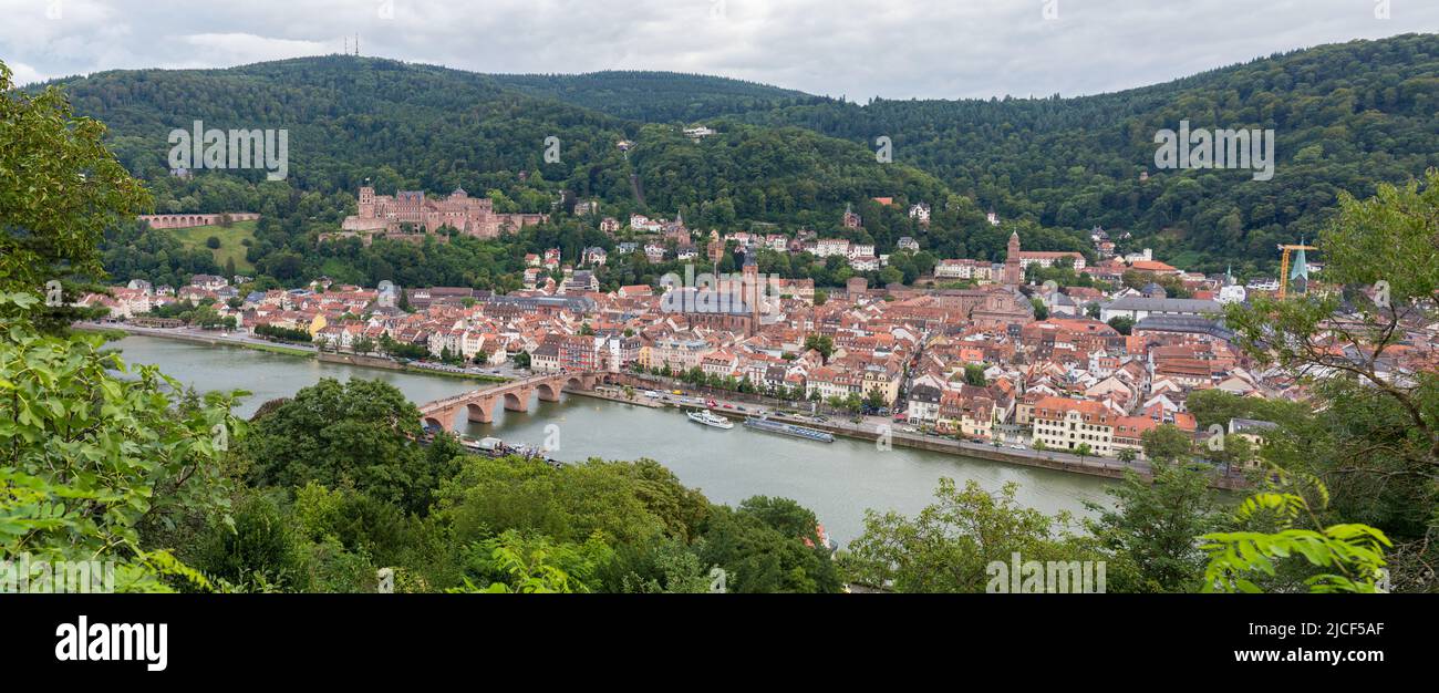Heidelberg, Germany - Aug 26, 2021: High angle panorama view on the city of Heidelberg. With Heidelberg castle and the old bridge. Stock Photo