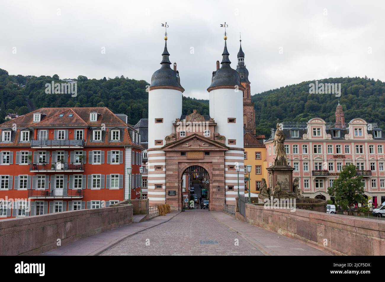 Heidelberg, Germany - Aug 27, 2021: View on the gate (Brückentor) of the old bridge ('Alte Brücke') of Heidelberg. No people. Stock Photo
